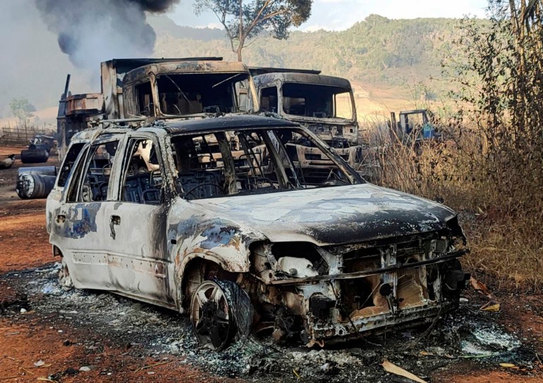 Smokes and flames billow from vehicles in Hpruso township, Kayah state, Myanmar