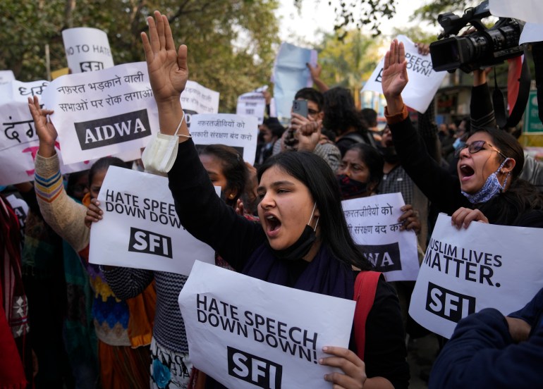 Activists shout slogans against hate speech in New Delhi