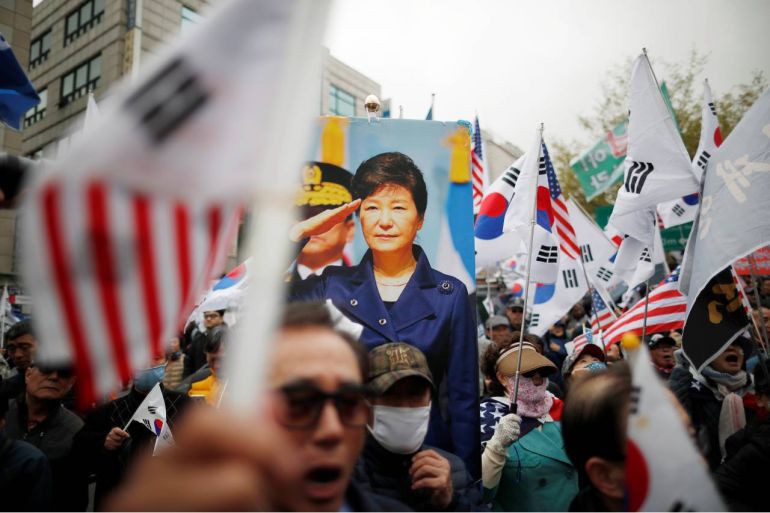 Supporters of former President Park Geun-hye gather outside a court