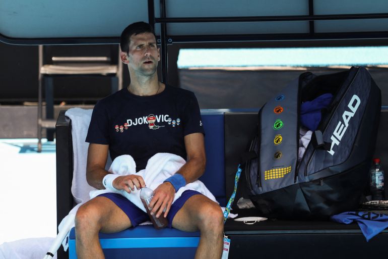 Serbian tennis player Novak Djokovic rests at Melbourne Park during training for the Australian Open.