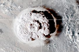 The eruption of an underwater volcano off Tonga, which triggered a tsunami warning for several South Pacific island nations, is seen in an image from the NOAA GOES-West satellite taken at 05:00 GMT January 15, 2022.
