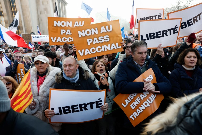People attend a demonstration called by French nationalist party "Les Patriotes" (The Patriots), to protest against a bill that would transform France's current coronavirus disease (COVID-19) health pass into a "vaccine pass", on Trocadero plaza in Paris, France