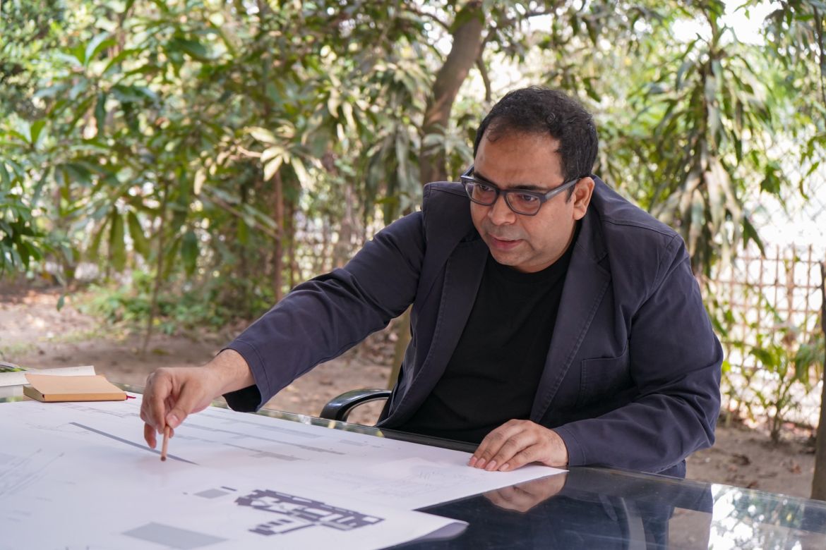 Architect Kashef Chowdhury looking at the drawing (design) at his office in Dhaka