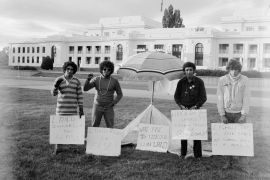 Activists Billy Craigie, Bert Williams, Michael Anderson and Tony Coorey stand outside Parliament House, Canberra on January 27, 1972