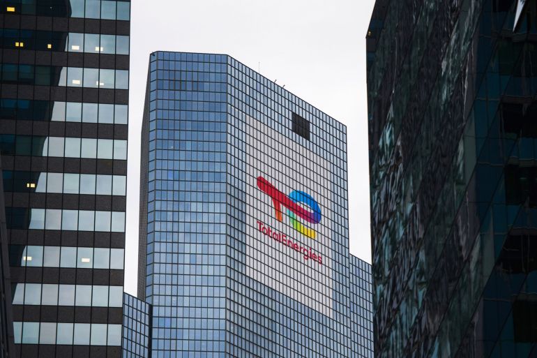 A logo on the TotalEnergies SE headquarters in the La Defense business district in Paris, France
