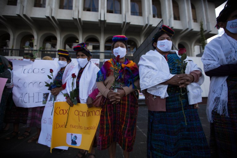 Indigenous Mayan Achi women rally outside a courthouse in Guatemala City