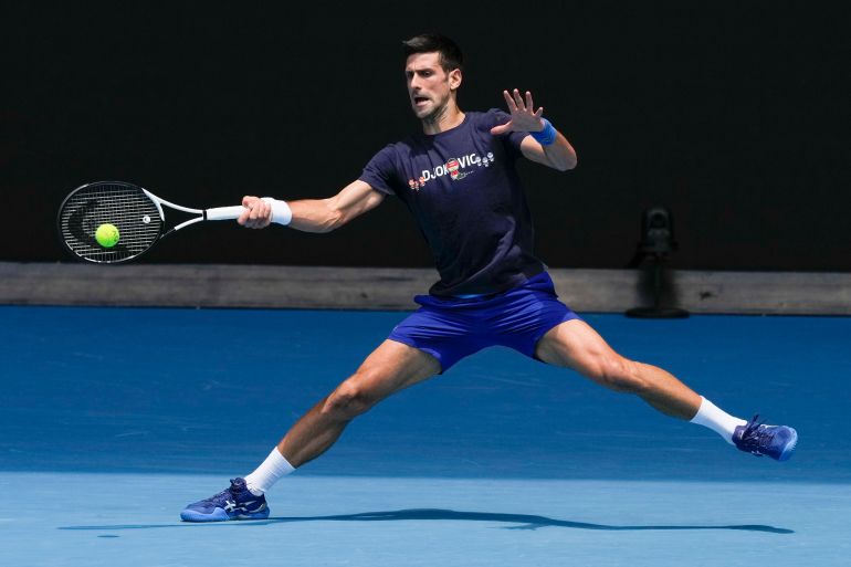 Novak Djokovic practices on Rod Laver Arena ahead of the Australian Open in Melbourne