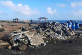 Damaged area in Nuku'alofa, Tonga, following Saturday's volcanic eruption near the Pacific archipelago.