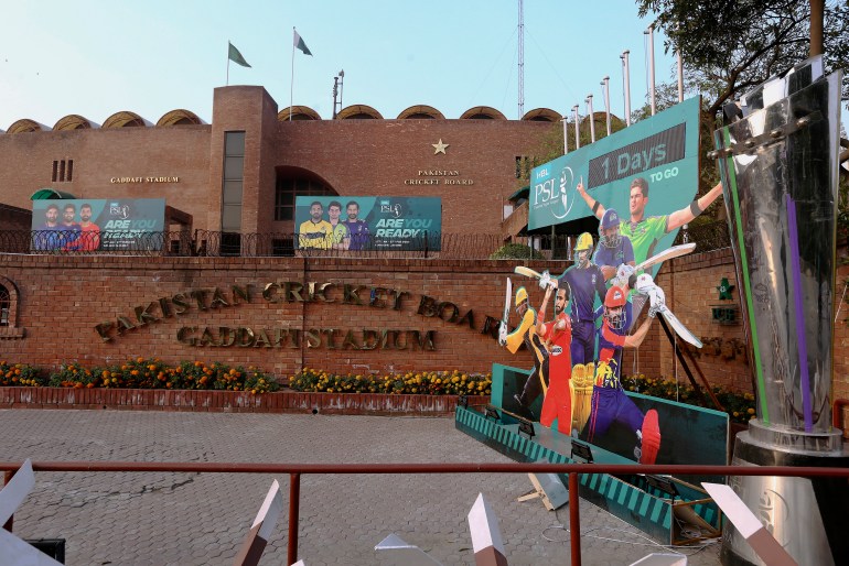 Cutouts of cricket players display outside the Gaddafi Stadium pakistan