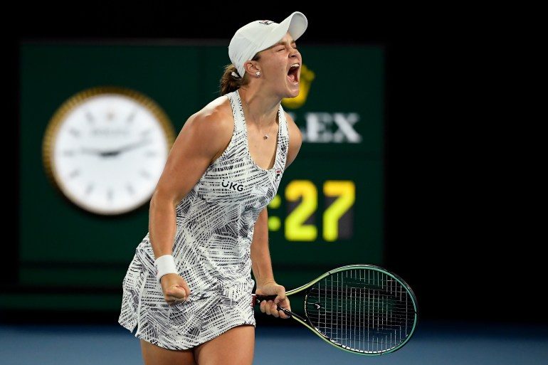 Ash Barty celebrates after defeating Danielle Collins of the US in the women's singles final at the Australian Open