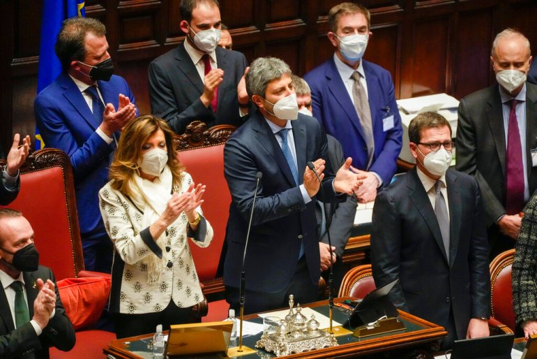 Italian lawmakers in parliament give a standing ovation
