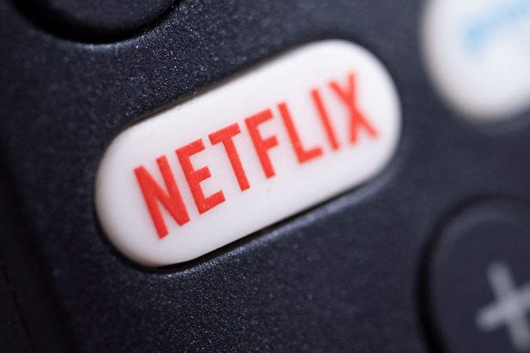The Netflix logo is seen on a TV remote controller