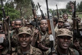 Ethiopian National Defence Forces (ENDF) soldiers shout slogans after finishing their training in the field of Dabat