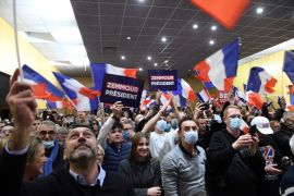 Far right supporters wave flags and banners in France