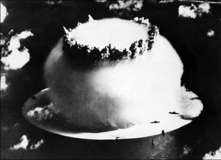 A mushroom cloud rises into the air following a nuclear test at Bikini atoll in the Pacific