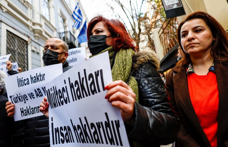 Protesters demonstrate in front of the Greece's Consulate in Istanbul