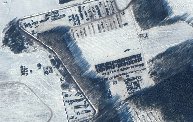 A satellite image shows a troop housing area and a vehicle park in Rechitsa, Belarus, February 4, 2022, picture taken by Maxar Technologies/Handout via REUTERS THIS IMAGE HAS BEEN SUPPLIED BY A THIRD PARTY. NO RESALES. NO ARCHIVES. MANDATORY CREDIT. DO NOT OBSCURE LOGO