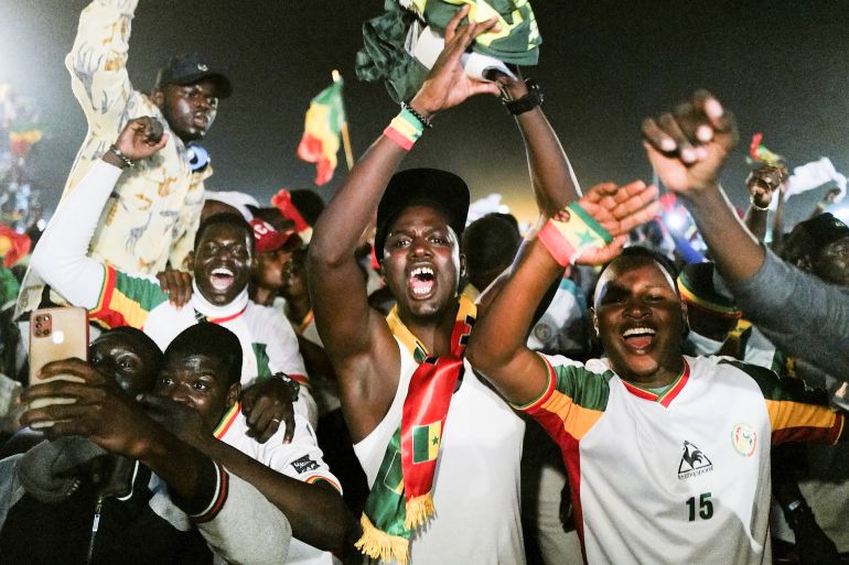 Senegal's fans celebrate after winning the Africa Cup of Nations final against Egypt