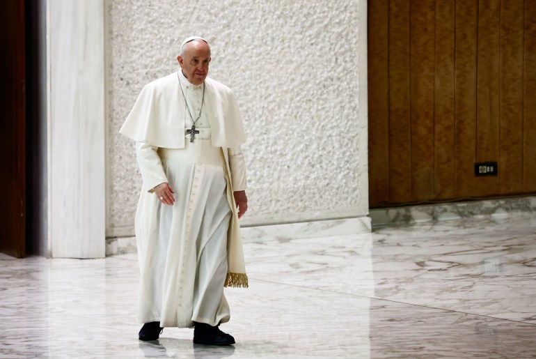 Pope Francis is seen arriving for the weekly general audience at the Paul VI Audience Hall at the Vatican