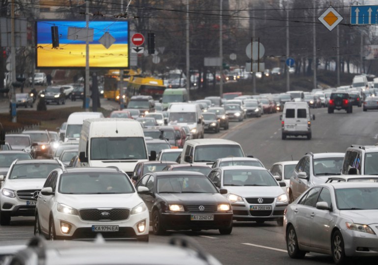 Long queues on the main traffic arteries out of the Ukrainian capital as residents fled by car.