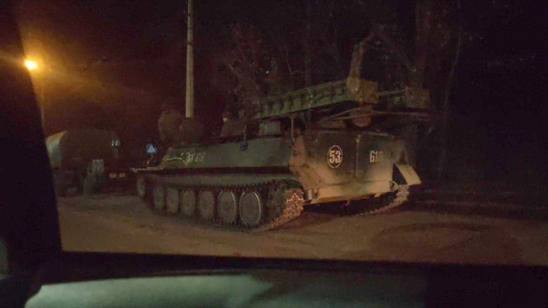 Russian military tanks and armored vehicles advance in Donetsk