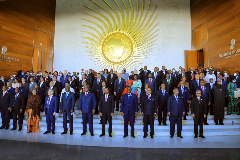 African heads of state stand on a podium and take a group photograph at the 35th Ordinary Session of the African Union (AU) Assembly in Addis Ababa, Ethiopia
