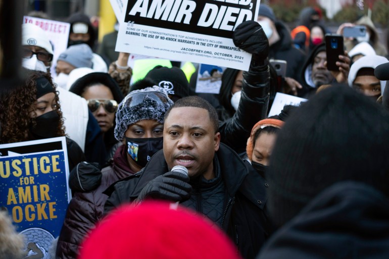 Andre Locke, the father of Amir Locke, speaks at a rally for his son 