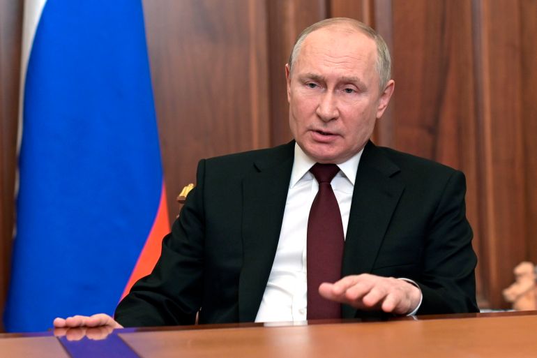 Russian President Vladimir Putin addresses the nation in the Kremlin in Moscow