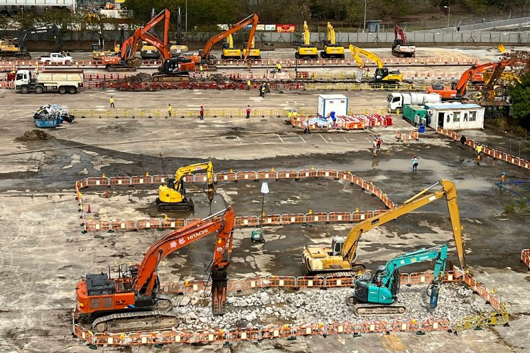 A construction site with diggers and foundations being built for a temporary medical facility in Hong Kong 