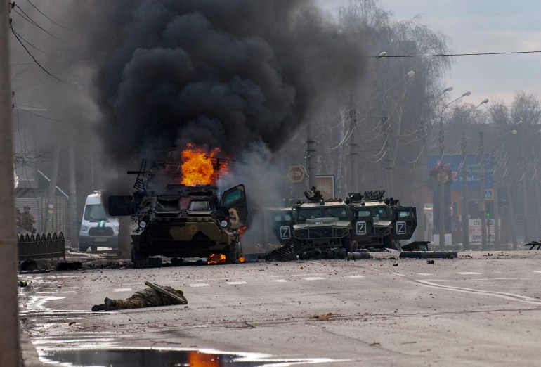 A Russian vehicle is burning in Kharkiv