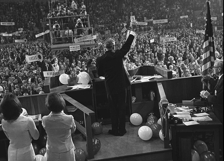 Barry Goldwater, waves to delegates at the Republican National Convention in 1964