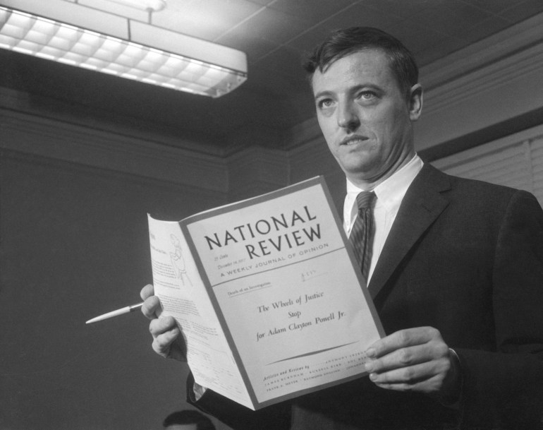 Magazine editor William F. Buckley, Jr. holds a copy of the National Review