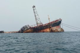 Wreckage of the Trinity Spirit floating production, storage and offloading vessel is seen after an explosion and fire broke out at Shebah Exploration & Production Company Ltd offshore production site