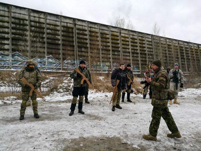 Ukrainian civilians train to become part of territorial defence outside Kyiv, Ukraine [Mansur Mirovalev/Al Jazeera]