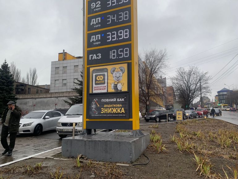 A queue is seen at a petrol station in Mariupol