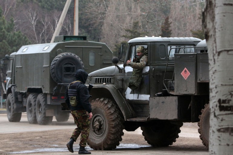 Russian army military vehicles are seen in Armyansk