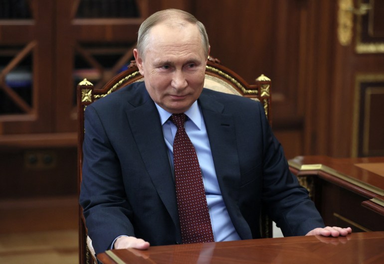 Russian President Vladimir Putin attends a meeting with the head of Russia's Union of Industrialists and Entrepreneurs