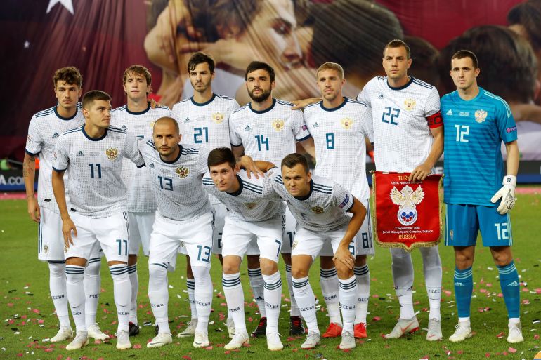 Russia players pose for a team group photo before a match against Turkey on September 7, 2018
