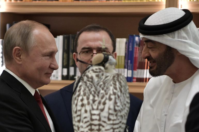 Russian President Vladimir Putin presents a gyrfalcon to Abu Dhabi Crown Prince Mohamed bin Zayed al-Nahyan at their meting in Abu Dhabi, United Arab Emirates, October 15, 2019.