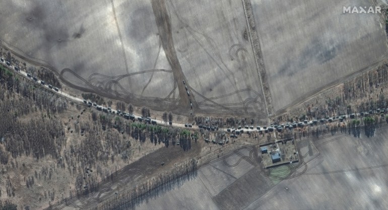 A satellite image shows southern end of convoy armour towed artillery trucks, east of Antonov airport, Ukraine, February 28, 2022.