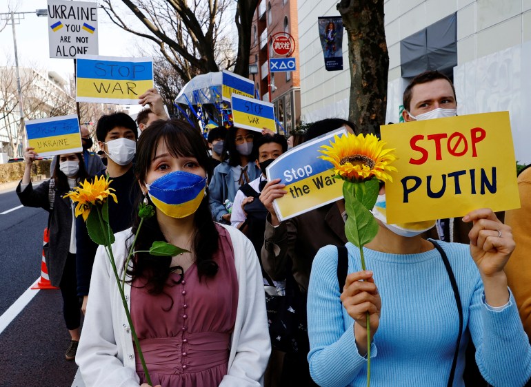Protesters in Tokyo participate in a march against Russia's invasion of Ukraine