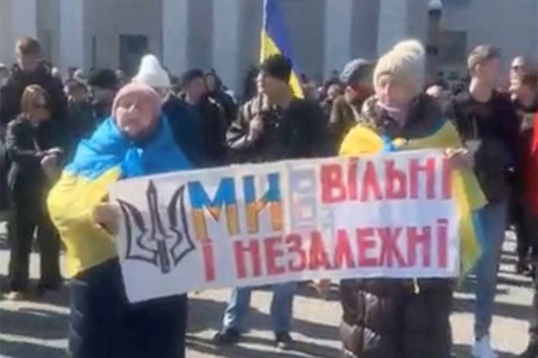 Livestreamed footage shows protesters taking to the streets in Kherson.
