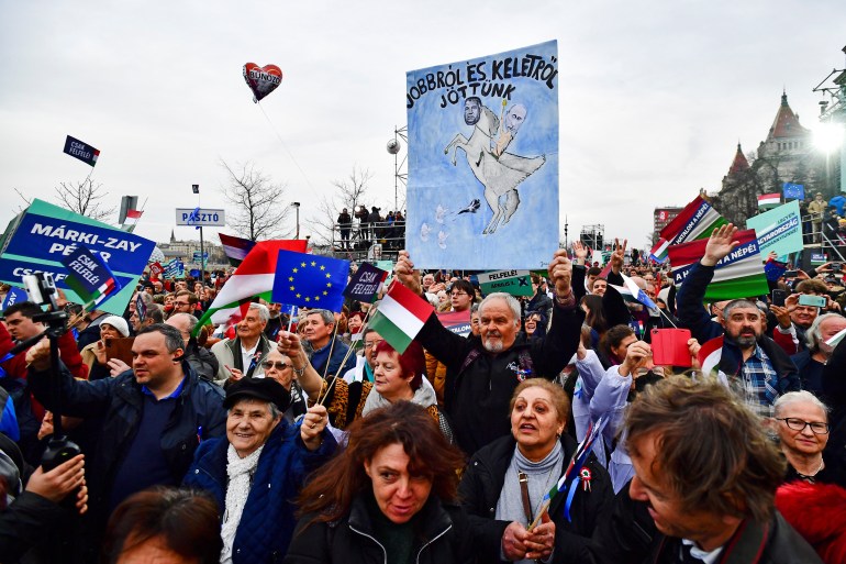 People attend a joint demonstration organised by opposition parties in Budapest