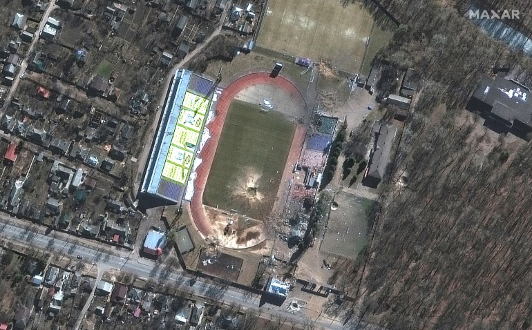 A satellite image shows a damaged Olympic sports training center, in Chernihiv, Ukraine, March 16, 2022. 