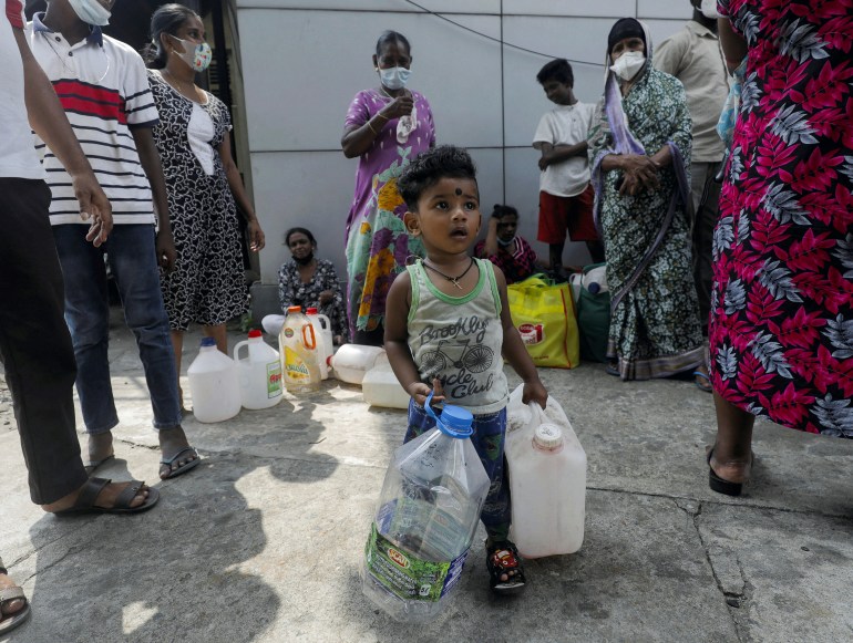 A child waiting to buy kerosene