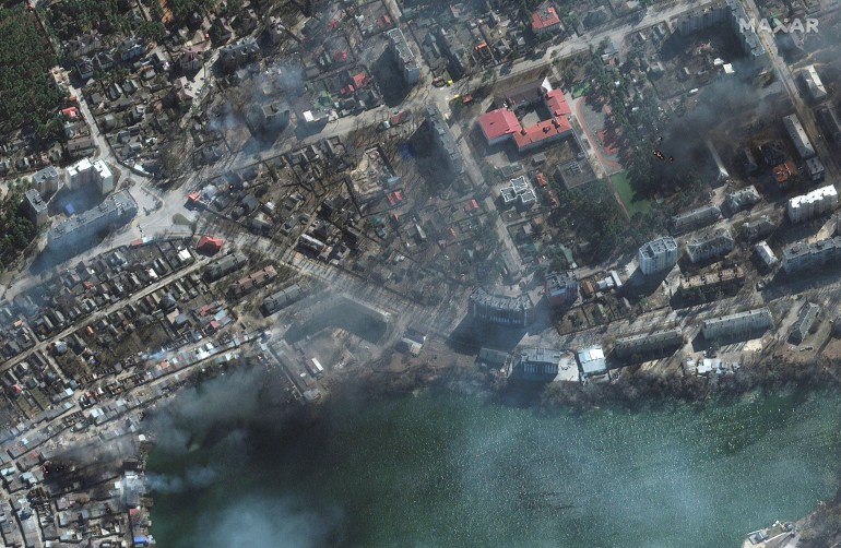 A satellite image shows damaged and burning buildings in Irpin, Ukraine, March 21, 2022.