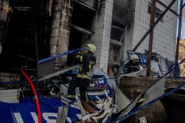 Rescuers work at a site of an industrial building damaged by an airstrike, as Russia's attack on Ukraine continues, in Kyiv Ukraine, in this handout picture released March 22, 2022. Press service of the State Emergency Service of Ukraine
