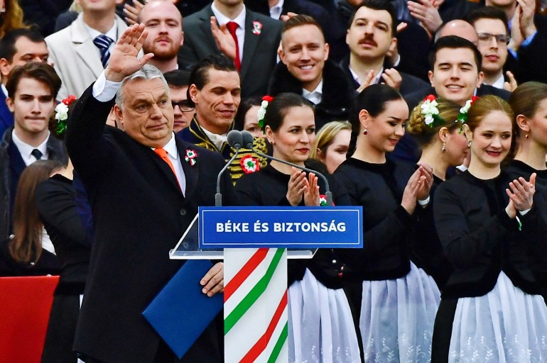 Hungarian Prime Minister Viktor Orban greets supporters