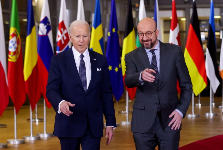 U.S. President Joe Biden and European Council President Charles Michel arrive for a European Union leaders summit, amid Russia's invasion of Ukraine, at the Europa Building in Brussels 