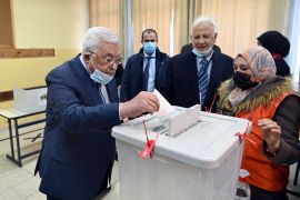 Palestinian President Mahmoud Abbas casts ballots for municipal and local governorate councils elections in Ramallah, in the Israeli-occupied West Bank, March 26, 2022.